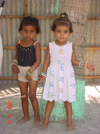 The child on the left is 26 months old and the one on the right is 52 months old.